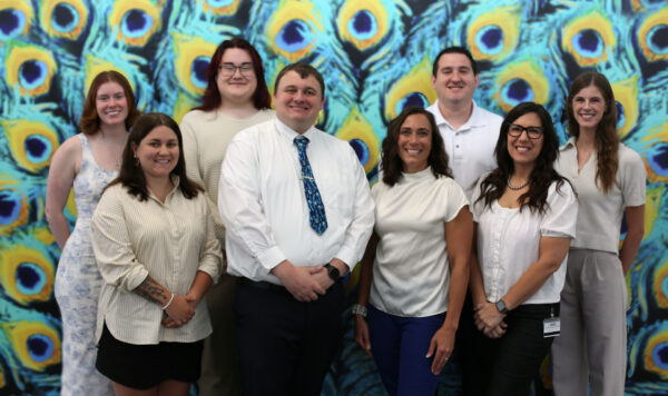 A group of UIU staff poses for a photo
