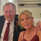 Richard and Chris Andres pose together dressed in formal wear