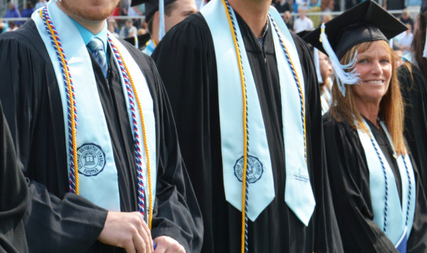 class gift graduates wearing philanthropy cords