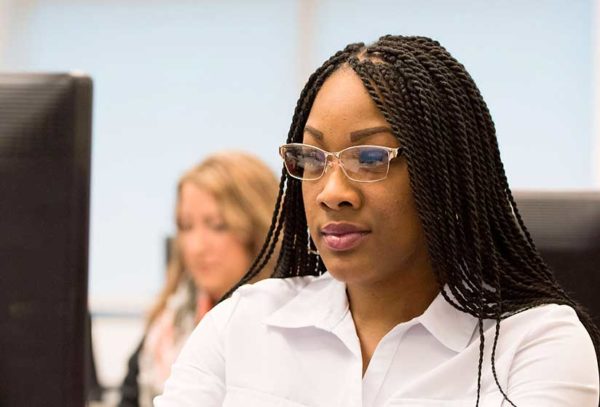 adult female student at computer