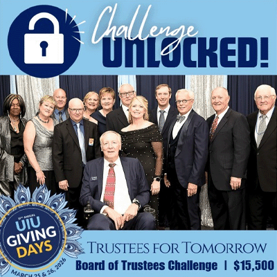 A graphic featuring the UIU Board of Trustees posing for a photo.