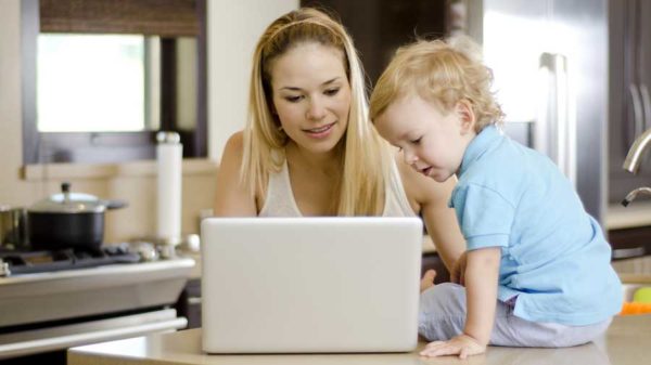 mom studying at home (stock)