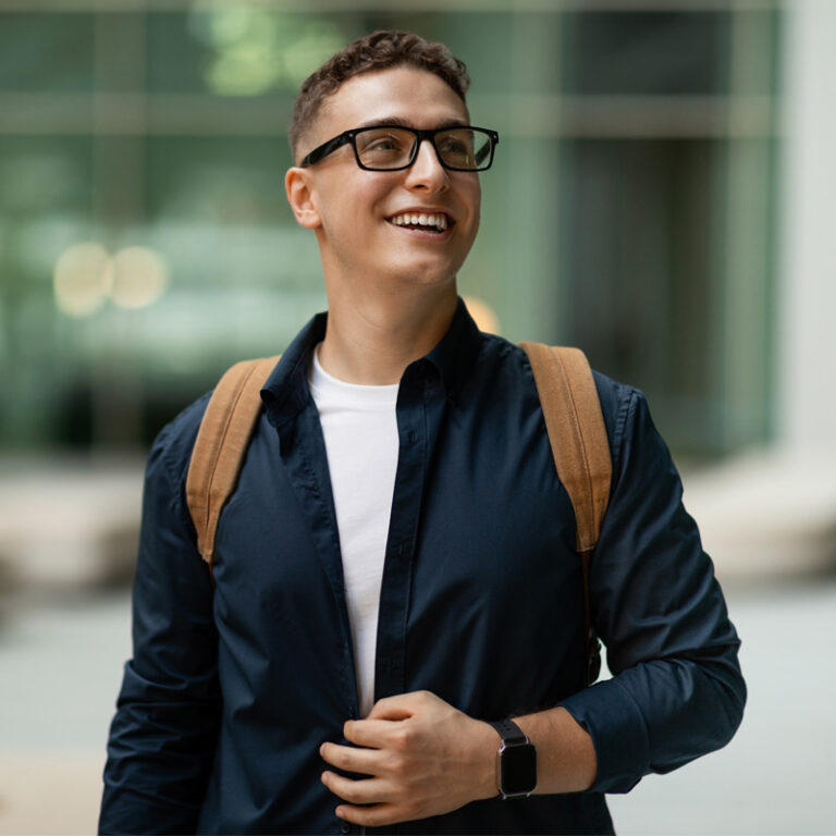 Student with backpack and glasses