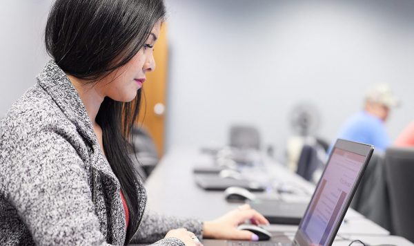 UIU Student on computer