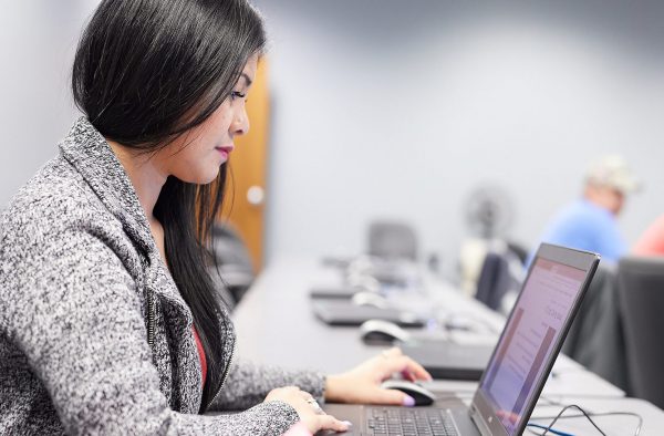 UIU Student on computer