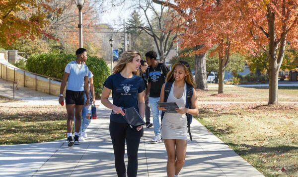 UIU students walking in autumn on the Fayette campus