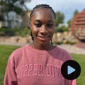 Headshot of Jasheana Tracey with video play preview button