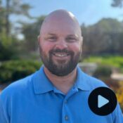 Headshot of Josh Jeans with video play preview button
