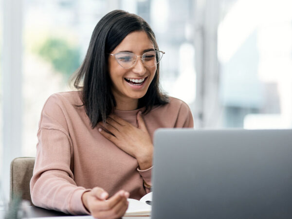 Woman studying with her laptop